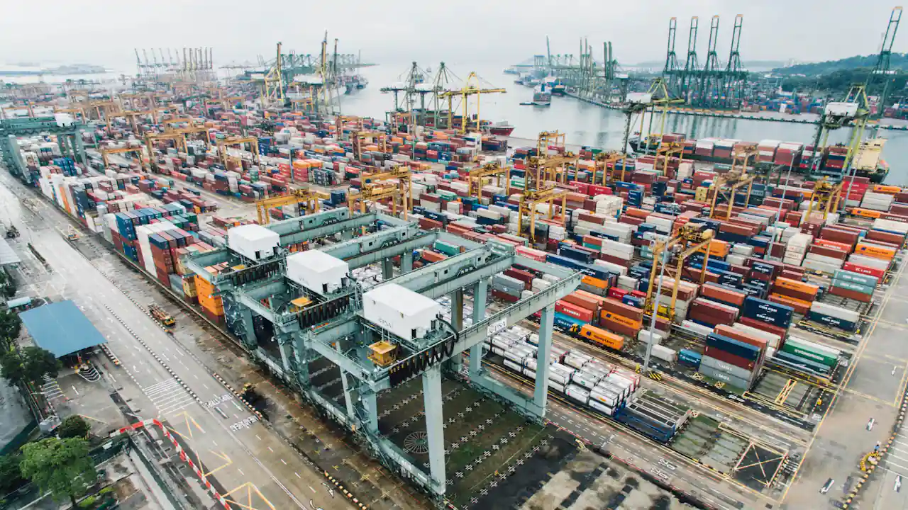 Container port with cargo cranes and ships
